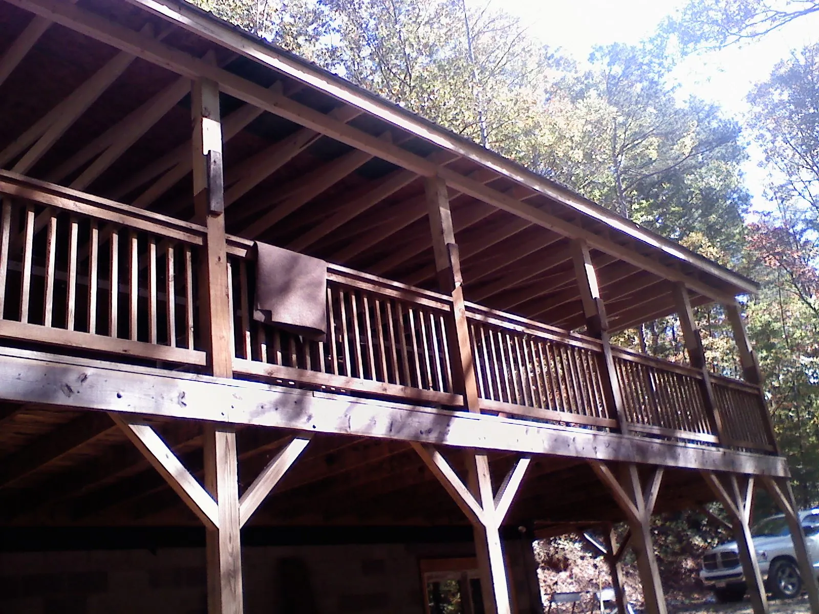 Timber framing under a new elevated porch and deck — Roof Leak Repair in Skyforest by Roofing Brothers